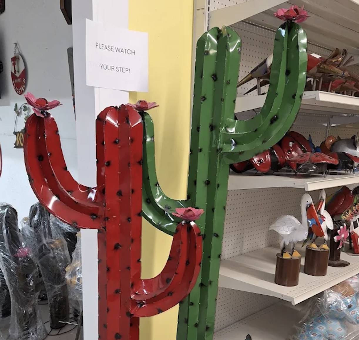 Metal cactus sculptures and Southwest themed outdoor décor pieces